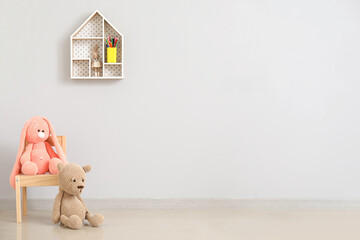 Chair with toys in interior of modern children's room