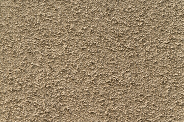 Abstract brown color rugged cement wall texture background
