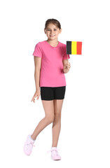 Little girl with flag of Belgium on white background