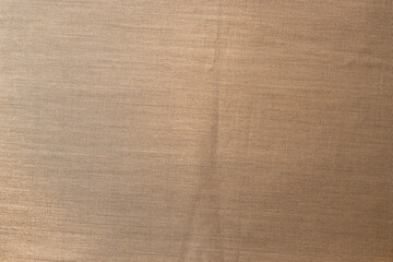 Dark brown color linen fabric background with abstract texture