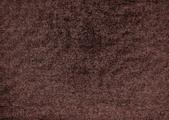 Reddish grunge texture on denim jeans fabric for background