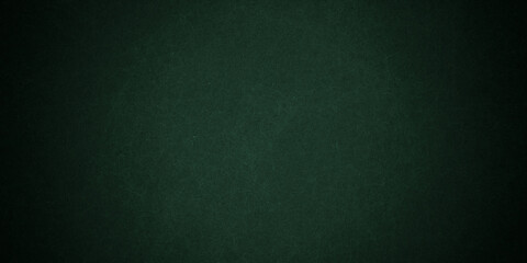 Abstract green architecture wall material. blank concrete grunge wall texture surface background with dark corners. rustic green board background for education

