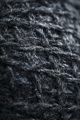 Gray threads of natural wool close-up in full screen.