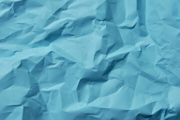 crumpled blue paper