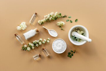 Set of white medical herbal cosmetics for skin care and beauty treatment with flowers