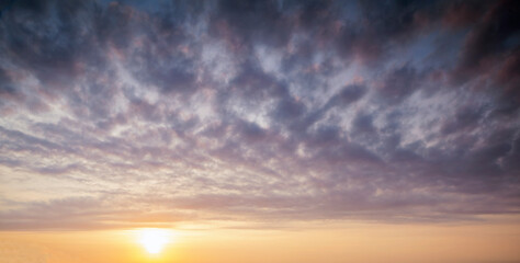 Cumulus clouds in the sky at dawn. For background and layer.
