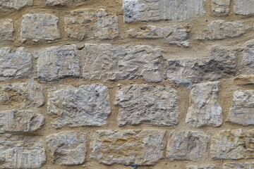 Close up view of an old stone wall