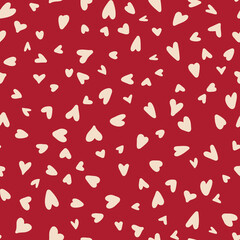 Hand drawn hearts seamless repeat pattern. Random placed, vector love sing elements all over surface print on red background.