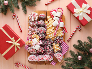 Different Christmas cookies on table