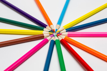 Fototapeta premium Colour pencils on white background. Painting supplies. 