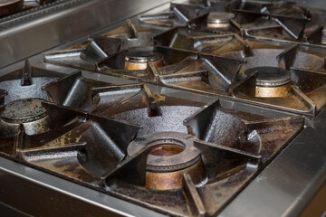 Gas stove in the kitchen of the restaurant.
