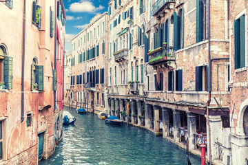 Traditional canal of Venice, beautiful retro view, Italy