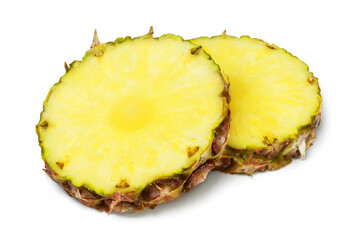 Ripe juicy round pineapple slices isolated on white background. Fresh fruits.