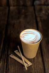 Latte, coffee in a glass with a picture. Hot drink.