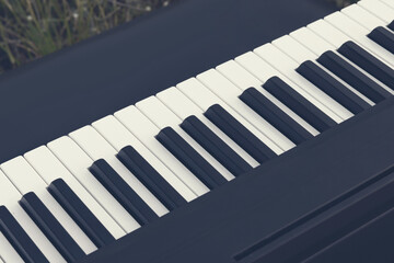closeup keys of electric piano keyboard