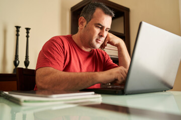 a man working on his laptop