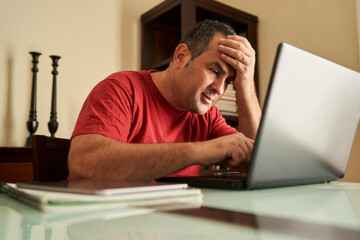 a man working on his laptop