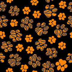Orange tiger paw print trails © Iryna