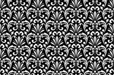 Floral pattern. Vintage wallpaper in the Baroque style. Seamless vector background. White and black ornament for fabric, wallpaper, packaging. Ornate Damask flower ornament