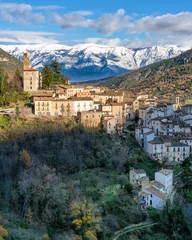 Fototapete The beautiful village of Anversa degli Abruzzi, covered in snow during winter season. Province of L'Aquila, Abruzzo, Italy. © e55evu