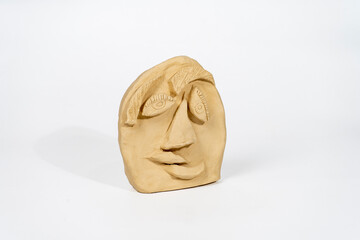 Abstract Face sculpture made of clay