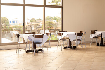 interior of restaurant with tables and chairs