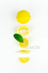Creative layout made half of lemon, slide, piece on white background. Flat lay. Food concept. Lemon fruit, citrus minimal concept, vitamin C.