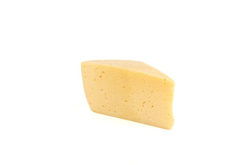 A piece of hard cheese isolated on a white background.