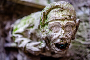 historic sculpture (gargoyle) at the city hall in munich