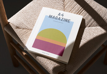 Fototapeta A4 Magazine on a Chair Mockup obraz