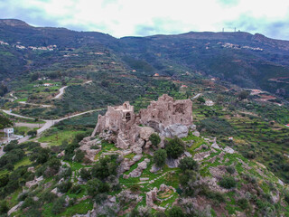 Aerial view of the Castle of Vatika or Castle of Agia Paraskevi at sunset. The castle is located in Mesohori village and has a wonderful view of Neapolis town and Elafonissos island, Laconia, Greece.