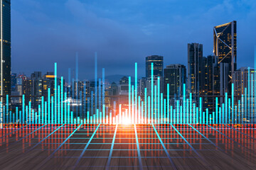 Rooftop with wooden terrace, Kuala Lumpur night skyline. Forecasting and business modeling of financial markets hologram digital charts. City downtown. Double exposure.