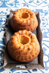 Kugelhopf, savory homemade Gugelhupf with bacon and herbs Close up.