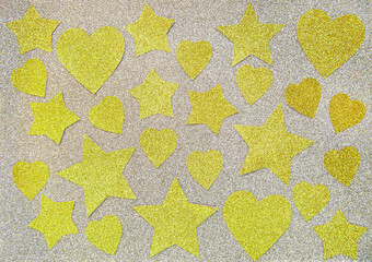 Abstract shiny background with gold stars and hearts. Flat layer.