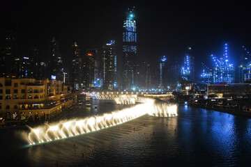 Fototapeta na wymiar Dubai night .Water show. Dubai Fountain Show At Night, UAE. 