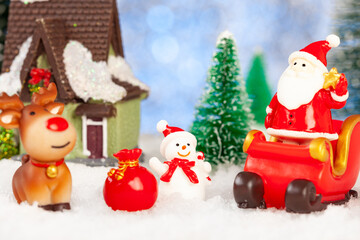 new year and christmas greeting card, santa claus and reindeer with gifts on sleigh, concept