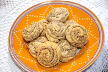 Fresh baked homemade swirled cookies on the small plate