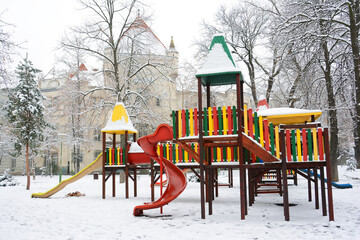 Empty children playground in winter time