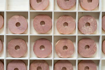Fototapeta premium cedar wood hanger rings arranged in a box