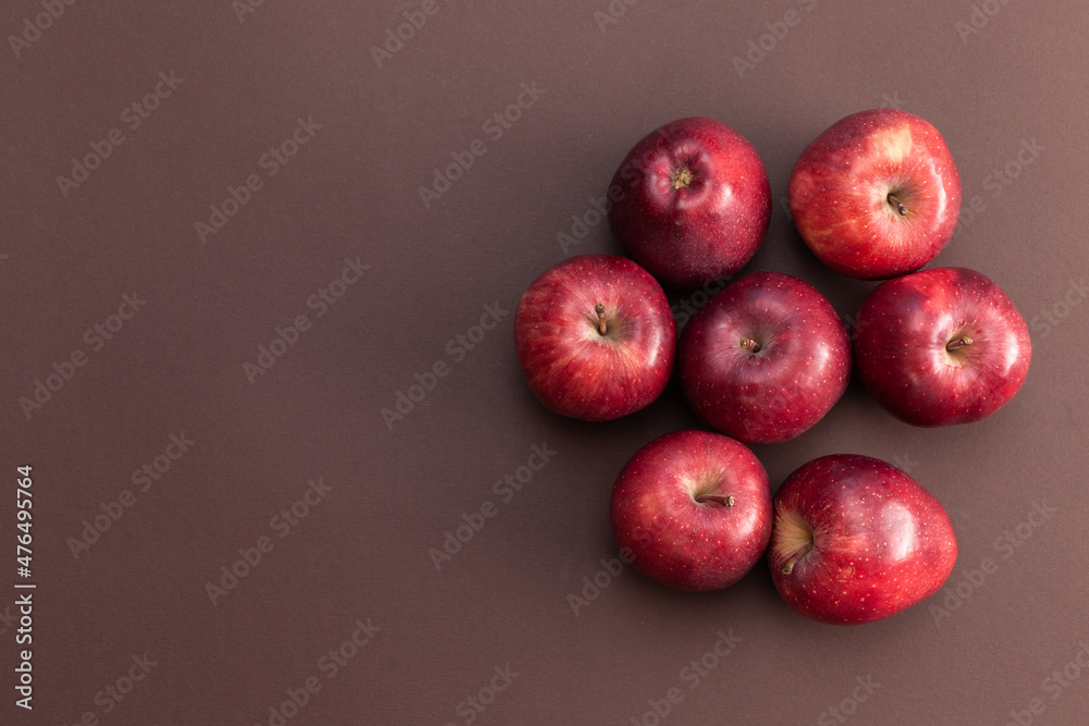 Canvas Prints red apples isolated on brown background