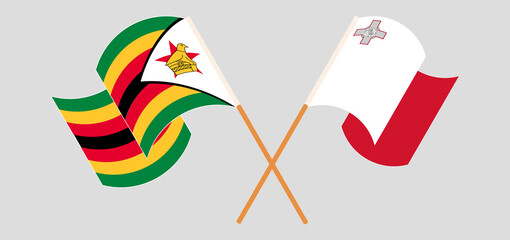 Crossed flags of Zimbabwe and Malta. Official colors. Correct proportion