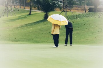 person walking in the rain