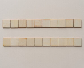 set of wood tiles on paper