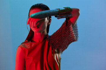 attractive woman red light silver armor chain mail fashion Lifestyle unaltered