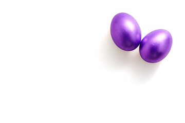 Purple easter eggs on white background with copy space for text. Colour of the year 2022.