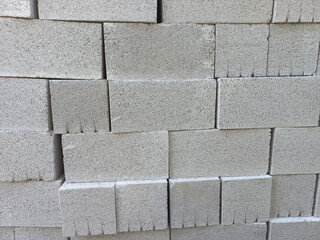 Fototapeta premium A texture of wall blocks on top of each other - construction materials concept