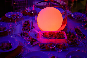 table setting in the evening in a restaurant