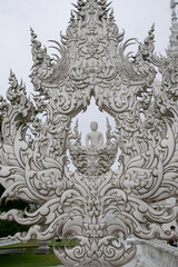 Fototapeta na wymiar buddha white temple chiang rai Thailand