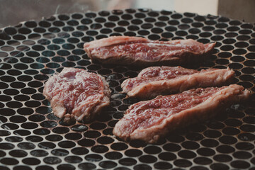meat's steak on the grill