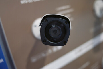 Obraz na płótnie Canvas CCTV security camera, closeup photo. Security cameras in showroom